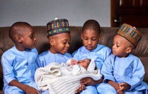 Little princess alert surrounded by 4 loving big brother's